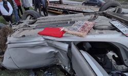 Köpeğe çarpmamak için manevra yapan otomobil takla attı 